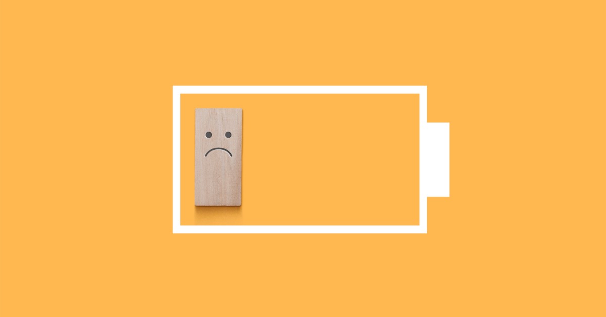 A graphic of a white battery with a small wooden block indicating a low charge. The block has a frowning face.